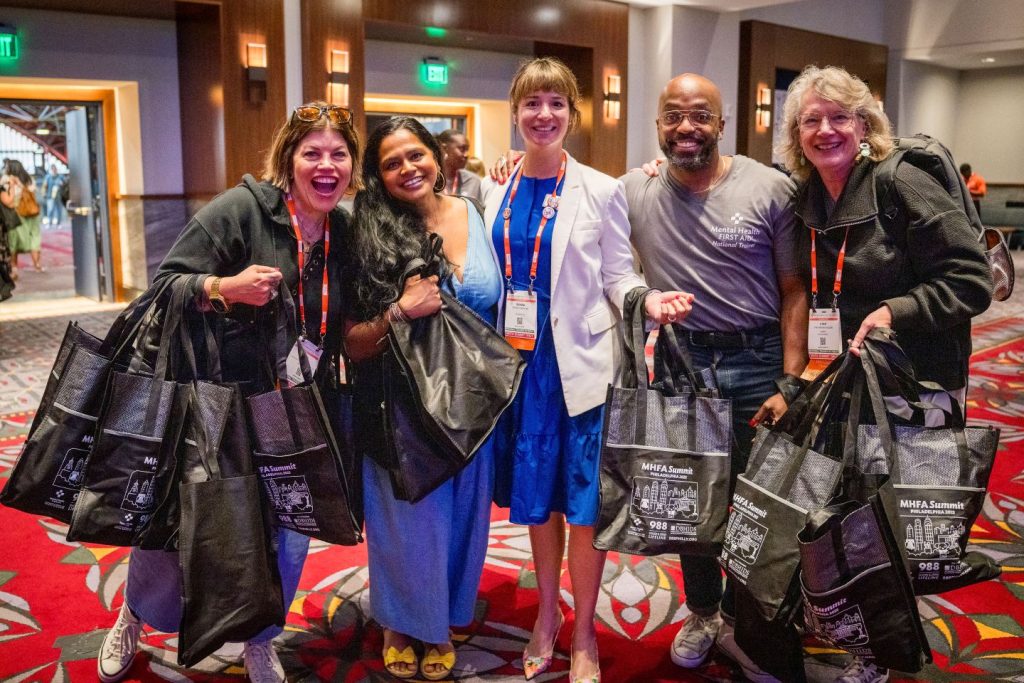 mhfa summit attendees arrive at conference
