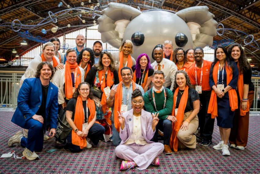 attendees pose in front of ALGEE at the 2026 MHFA Summit