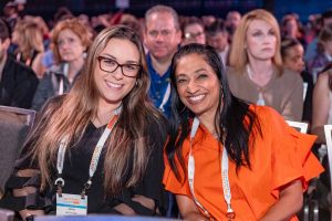 two natcon attendees smile